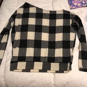 Off shoulder buffalo check sweater